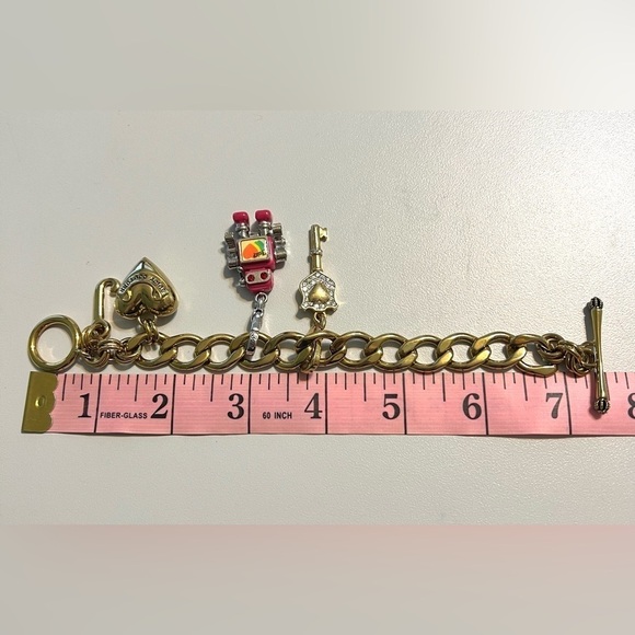 Juicy Couture vintage goldtone chunky bracelet w/rare robot charm,key, heart & J - Picture 9 of 10